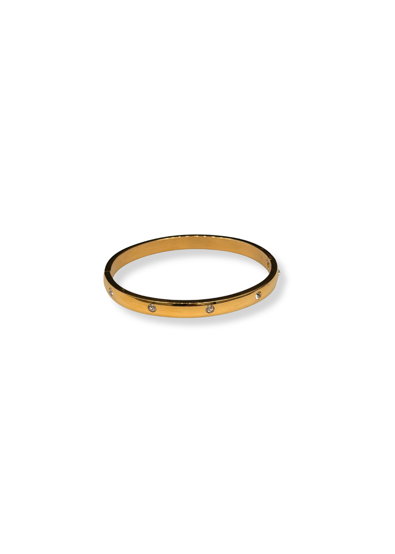 Goudkleurige bangle met strass steentjes