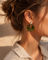 Oorbellen met groene hanger